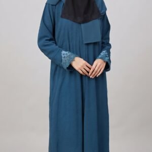 Teal blue abaya with embroidered sleeve cuffs, matching blue hijab, and black embroidered niqab | Azmira Collection