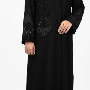 Black embroidered abaya with intricate floral detailing on the front and sleeves, paired with a matching hijab | Azmira Collection