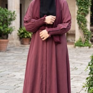 Burgundy abaya with matching burgundy hijab and black niqab, featuring elegant gathered sleeve cuffs | Azmira Collection
