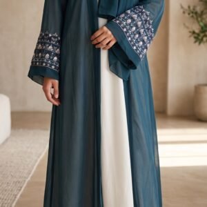 Blue open abaya with intricate floral embroidered cuffs and matching blue hijab over a white inner dress | Azmira Collection